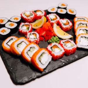 Plate of three rolls: Philadelphia, Salmon & Cucumber and California & Salmon