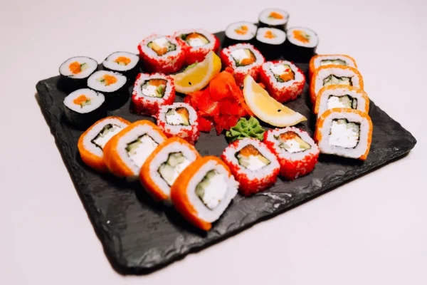 Plate of three rolls: Philadelphia, Salmon & Cucumber and California & Salmon