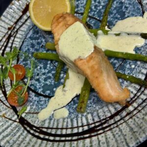 Salmon steak in creamy sauce