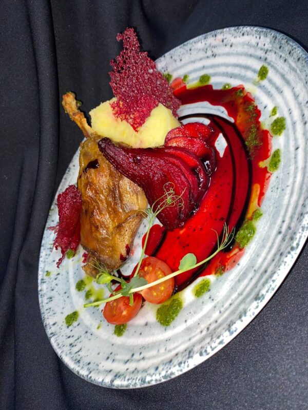 Duck's leg with marinated pear