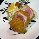 Crispy battered tuna fillet with vegetables
